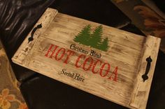 a wooden sign sitting on top of a leather chair