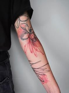 a person with a tattoo on their arm