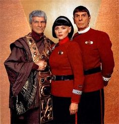 two men and a woman in star trek costumes