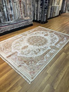 an area rug is on the floor in front of carpet samples