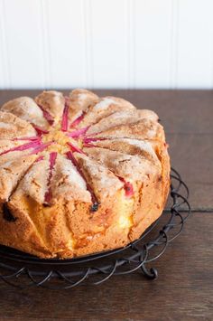 a cake sitting on top of a metal rack