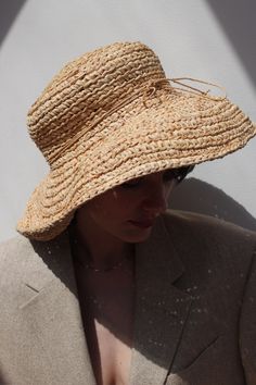 Vintage stunning straw hat with wide brim and tie accent. Favorite classic that can be worn at the beach or around town :) Can be styled with gold toned jewelry and favorite market dresses or over swim. Material not listed, assuming raffia Tag reads Kaminski Australia - Handmade in Madagascar Measures approximately: 22.5" circumference / 5" brim Some light wear to the inner head band - does not affect the overall look or wear. If you would like additional info or images prior to final sale purch Natural Panama Hat For Beach And Kentucky Derby, Adjustable Natural Sun Hat For Garden Party, Vintage Beach Hats For Summer, Bohemian Natural Straw Hat For Kentucky Derby, Classic Woven Sun Hat For Beach, Bohemian Natural Sun Hat For Kentucky Derby, Natural Bohemian Sun Hat For Kentucky Derby, Bohemian Natural Panama Hat For Garden Party, Chic Gold Hat For Spring