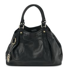 This is an authentic GUCCI Guccissima Medium Sukey Tote in Black. This chic shoulder bag is crafted of pleated Guccissima monogram embossed leather in black.The bag features rolled leather top handles with polished light brass hardware. The top opens to a spacious natural linen fabric interior with a zipper pocket. Large Black Purse, Shoulder Bag Outfit, Dream Bags, Slouchy Bag, Winter Closet, Natural Linen Fabric, Buy Bags, Black Leather Tote Bag, Gucci Tote