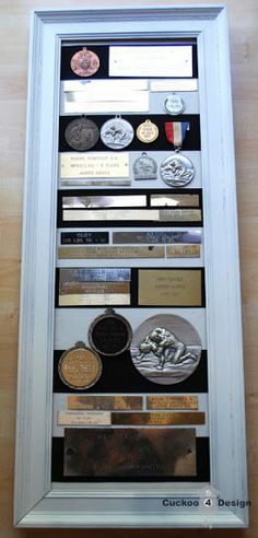 a display case with many different medals on it