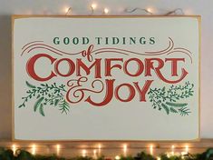 a sign that says, good tidings of comfort and joy