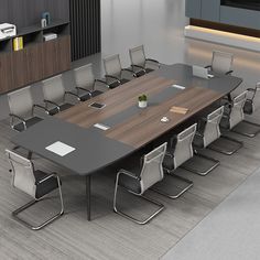 a large conference table with chairs around it