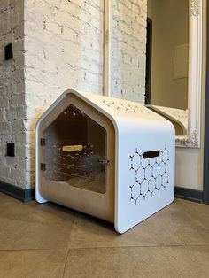 the dog house is made out of cardboard