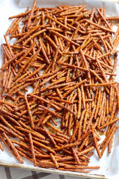 sweet potato sticks on a baking sheet ready to be baked in the oven or used as appetizer