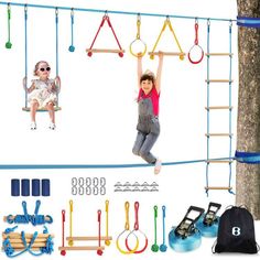 a child swinging on a swing set with other toys and accessories for him to use