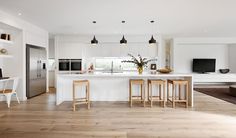 the kitchen is clean and ready to be used as a dining room or living room