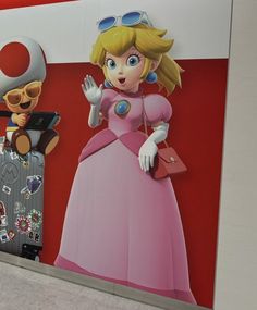 there is a giant mario and princess peach mural on the side of a wall in an airport