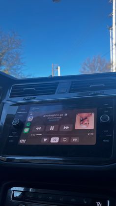 an electronic device in the dashboard of a car