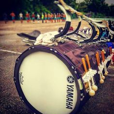 a group of drums sitting on top of a parking lot