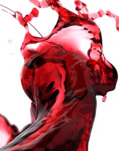 red liquid is flowing down the side of a woman's body in this artistic photo