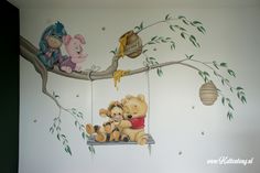 a mural on the wall of a child's room with teddy bears and other toys