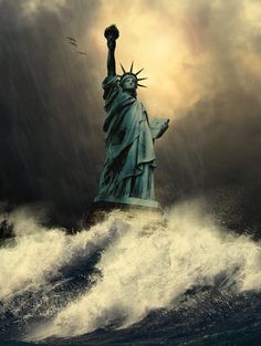 the statue of liberty is in the middle of an ocean with waves crashing around it