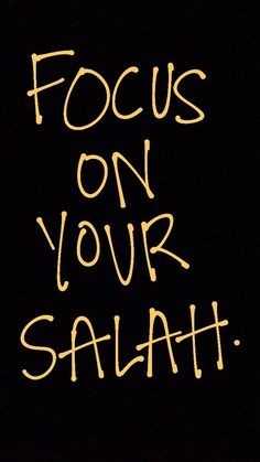 the words focus on your salah are written in yellow and orange ink against a black background