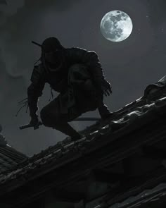 a man on top of a roof with a knife in his hand and a full moon behind him