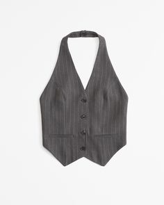 Versatile vest in our everyday menswear fabric and tailored fit, with button-through detail, non-functional front pockets and halter neckline. Female Features, Halter Vest, Pinstripe Pattern, Pinstriping Designs, Halter Neckline, Womens Fall, Women's Tops, Womens Vest, Evening Wear