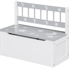 a white toy bench with grey stars and moon decals on it's seat