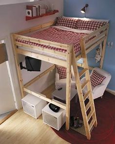 a bedroom with a bunk bed and red checkered bedspread on the bottom