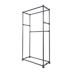 a black metal rack with four shelves on wheels and one shelf attached to the wall