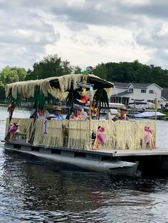 a boat with some people on it in the water