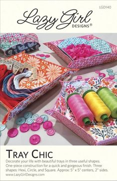 an advertisement for the lazy girl designs sewing kit with colorful thread and spools