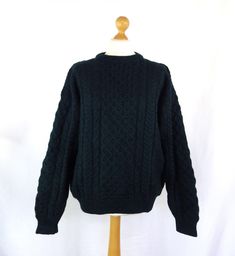 A beautiful quality vintage chunky cable knit men's sweater in a rich dark racing green tone.  Size: L  Chest: 52"  Pit to pit: 26"  Pit to cuff: 21.5"  Collar to cuff: 29.5"  Length: 25.5"  It is in lovely condition.  Please do contact us for more information or if you would like to combine postage on multiple items. Pull Vintage, Mens Pullover, Green Tone, Knit Men, Racing Green, Sweater Jumper, Jumper Sweater, Men's Sweater, Cable Knit