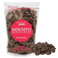 a bag of dark chocolate covered merckens next to it's packaging label