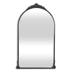 an ornate arched mirror on a white background