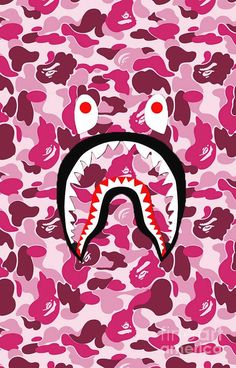 a pink camo background with a shark's mouth in the center and two red eyes