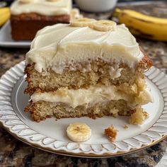 a slice of banana cake on a plate with bananas in the backgroung