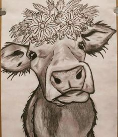 a drawing of a cow with flowers on its head