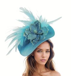 Turquoise Blue Feather Flower Ladies Royal Ascot Fascinator Hat Headband Womens Kentucky Derby Headpiece Day Headwear Wedding Church Hats Hats By Cressida Kentucky Derby & Ascot Fascinator Hats Turquoise Blue Jeanine Flower Feather Fascinator  Gorgeous array of feathers surround a large turquoise magnolia flower set on a round soft turquoise base.  Base measures 14 inches wide This turquoise headpiece is mounted with a matching headband. If you prefer a headband to match your hair, please make a Blue Fascinator With Handmade Flowers For Kentucky Derby, Blue Fitted Fascinator For Beach, Blue Adjustable Fascinator For Summer, Adjustable Blue Fascinator For Summer, Blue Handmade Flowers Fascinator For Races, Adjustable Light Blue Fascinator For Spring, Blue Mini Hats With Handmade Flowers For Royal Ascot, Adjustable Light Blue Mini Hat For Kentucky Derby, Light Blue Adjustable Mini Hats For Kentucky Derby