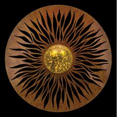 an image of a circular object that looks like it is made out of gold and black