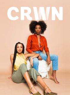 two women sitting next to each other in front of a sign that says crwn