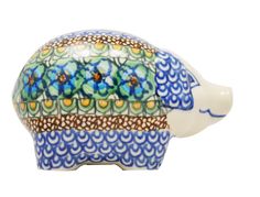 a blue and white ceramic elephant with flowers on it's trunk, sitting in front of a white background