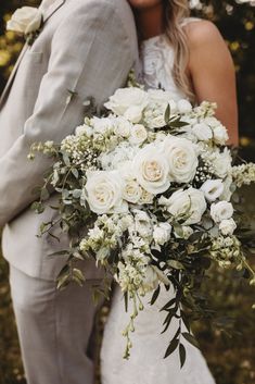 boutonniere, eucalyptus, wedding bouquet, bridal bouquet, white bridal bouquet, white wedding bouquet, playa blanca rose, white rose, lisianthus, larkspur, spray rose, babies breath, all-white wedding, wedding flowers, Italian ruscus, gunni eucalyptus, intimate wedding, backyard wedding, summer wedding, romantic wedding, white wedding, J.Blu Design Wedding and Event Florist in Peoria, Illinois wedding, central Illinois wedding, midwest wedding, Always Flourishing Photography, wedding florist Cascade Bridal Bouquet, Bride Bouquets White, White Flower Bouquet, White Rose Bouquet, Greenery Bouquet, White Roses Wedding, Casablanca Bridal, Wedding Bouquets Bride, Bridal Bouquet Flowers