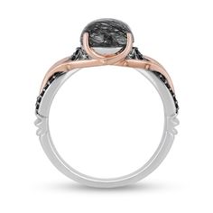 With elegant opulence, this gemstone and diamond ring from the Enchanted Disney Fine jewelry Villains Collection inspired by Maleficent mystifies and amazes. Crafted in sterling silver and 10K rose gold, this enticing style showcases a 10.0 x 8.0mm oval-shaped rich black rutilated quartz set in rose gold prongs that twist into thorny vines. Silver ribbons of alluring enhanced black diamonds glisten underneath in a crossover split-shank design, all set atop crown insets. Captivating with 1/6 ... Maleficent Engagement Ring, Disney Villan Rings Engagement, Enchanted Ring Zales, Unique Black Diamond Engagement Ring Zales, Maleficent Accessories, Disney Villain Jewelry, Gothic Engagement Ring, Disney Fine Jewelry, Enchanted Disney Fine Jewelry