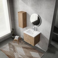 a bathroom with a sink, mirror and rug on the floor in front of it