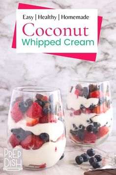 two glasses filled with yogurt and berries