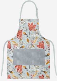 an apron with flowers and leaves on it