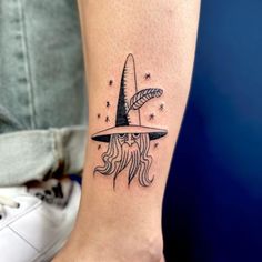 a wizard hat tattoo on the ankle