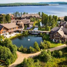 an aerial view of a lake surrounded by homes