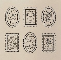 four stamps with different designs on them