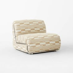 a beige and white checkered chair sitting on top of a white floor