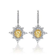 Everleigh 8 Carat Fancy Light Yellow IF - VS2 Oval Shape Diamond Lever Luxury Yellow Gold Diamond Earrings For Evening, Luxury Yellow Gold Cluster Earrings With Vvs Clarity, Luxury Gia Certified Oval Diamond Earrings, Luxury Oval Gia Certified Earrings, Luxury Hallmarked Oval Diamond Earrings, Luxury Oval Diamond Earrings With Halo Design, Oval Diamond Earrings, Oval Diamond Earring, Eternity Band Engagement Ring