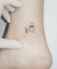 a person with a small tattoo on their foot