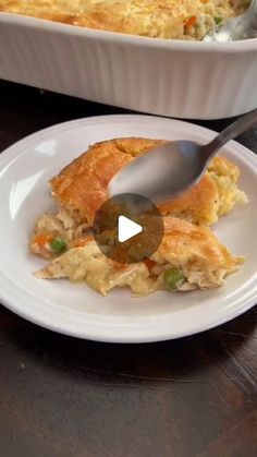 a white plate topped with food next to a casserole dish